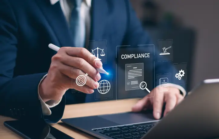 Businessman working on compliance documents